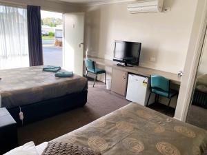 Voodi või voodid majutusasutuse Dalvue Motel toas