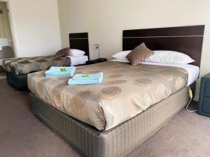 Voodi või voodid majutusasutuse Dalvue Motel toas