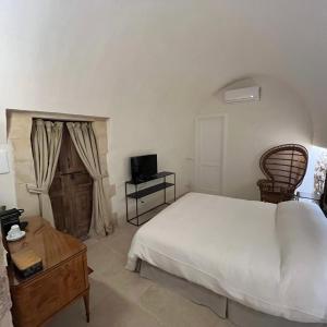 TV a/nebo společenská místnost v ubytování B&B Scicli La Casuzza