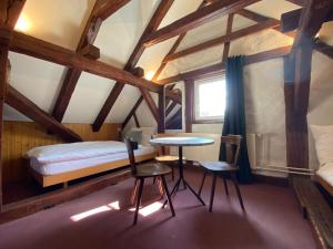 Hotel Untertor by Maier - Self-Check-in客房内的一张或多张床位