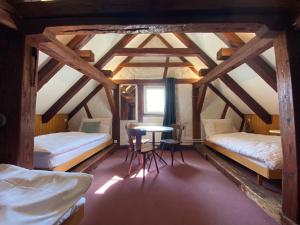 Hotel Untertor by Maier - Self-Check-in客房内的一张或多张床位