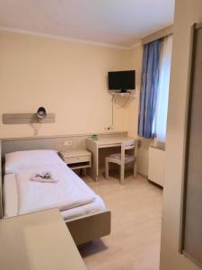 Voodi või voodid majutusasutuse Gasthof Sauer GmbH toas