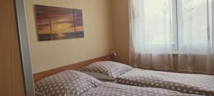 Postel nebo postele na pokoji v ubytování moderne 3-Raum Ferienwohnung Strandmöwe mit Panoramafenster