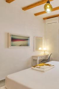 Posteľ alebo postele v izbe v ubytovaní Eressian Lodgings - Skala Eressos