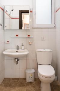 Kúpeľňa v ubytovaní Kamelia Apartment