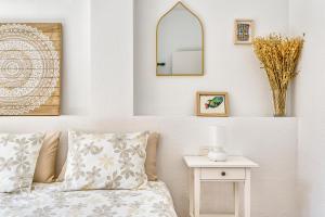 Ein Bett oder Betten in einem Zimmer der Unterkunft Bright & Breezy MERCED