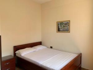 Postel nebo postele na pokoji v ubytování The First Hotel Saranda