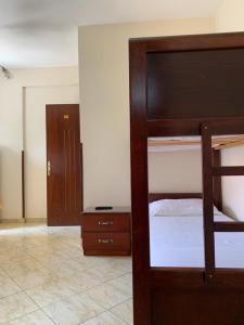 Postel nebo postele na pokoji v ubytování The First Hotel Saranda