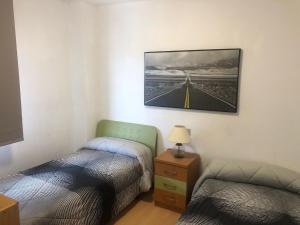 Postel nebo postele na pokoji v ubytování Apartamento Oropesa del Mar en primera linea de playa + 5 fotografií