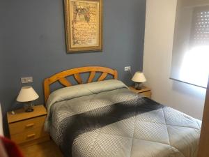 Postel nebo postele na pokoji v ubytování Apartamento Oropesa del Mar en primera linea de playa