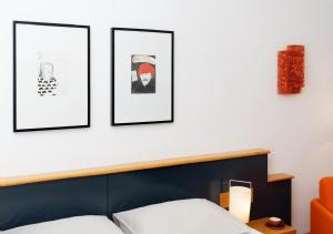 Katil atau katil-katil dalam bilik di Boutique Hotel Hauser