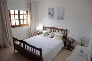 Postel nebo postele na pokoji v ubytování CASA BASTIAN 24 + 14 fotografií