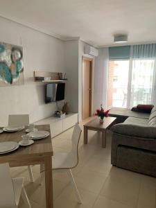 Televízia a/alebo spoločenská miestnosť v ubytovaní Sonata first line apartment