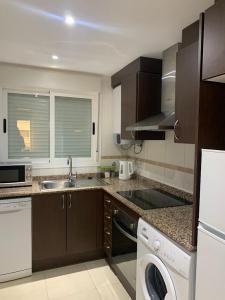 Kuchyňa alebo kuchynka v ubytovaní Sonata first line apartment