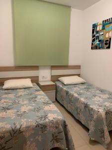 Posteľ alebo postele v izbe v ubytovaní Sonata first line apartment