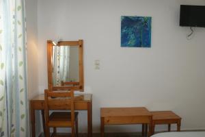 TV a/nebo společenská místnost v ubytování Hotel Eleftheria