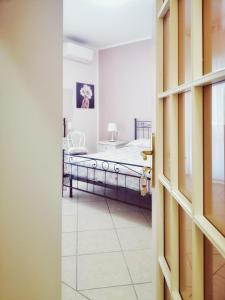 Postel nebo postele na pokoji v ubytování a CASA di CECY