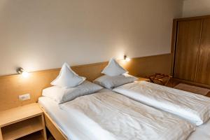 Postel nebo postele na pokoji v ubytování Residence Greymold