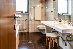 Koupelna v ubytování Residence Greymold + 35 fotografií