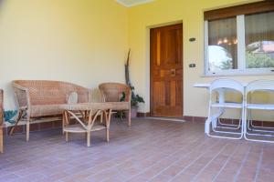 A seating area at Homiday - Villino Filippi Még 16 kép