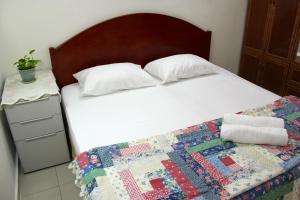 Pinang Muslim Homestay 객실 침대