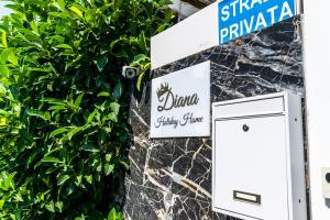 Certyfikat, podpis lub inny dokument wystawiony w obiekcie Diana Holiday Home