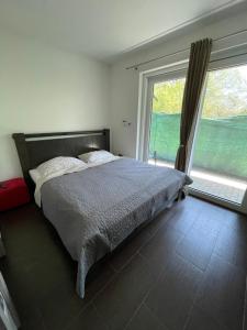 Posteľ alebo postele v izbe v ubytovaní Majer Bojnice