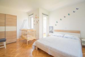 Posteľ alebo postele v izbe v ubytovaní Villa Pia