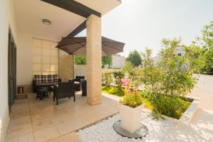 Vonkajšia záhrada v ubytovaní Villa Pia