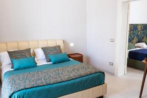 Postel nebo postele na pokoji v ubytování Family Green Suite