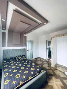Postel nebo postele na pokoji v ubytování Immeuble Adam