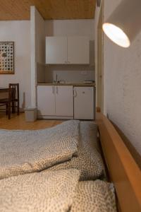 Postel nebo postele na pokoji v ubytování Apartmani LUKA Perućac