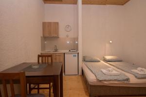 Postel nebo postele na pokoji v ubytování Apartmani LUKA Perućac