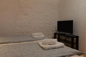 Postel nebo postele na pokoji v ubytování Apartmani LUKA Perućac