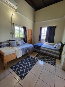 Кровать или кровати в номере Memories Cottage and Apartments