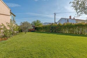 Vonkajšia záhrada v ubytovaní Cottage Lucas