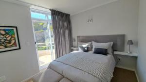 Voodi või voodid majutusasutuse 2WhiteWaters Bloubergstrand Homestay toas +6 fotot