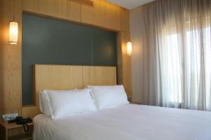 Valley Boutique Hotel客房内的一张或多张床位
