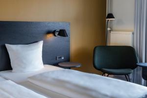 Letto o letti in una camera di Comwell Middelfart