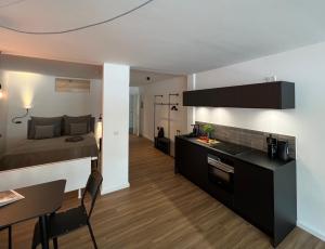 O bucătărie sau chicinetă la Apartmenthaus Stade Schwingewiesen Apartment 2