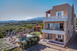 an image of a villa with a view of a resort at Villa Aretousa 2 in Agia Marina Nea Kydonias