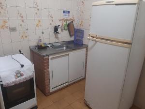 Virtuvė arba virtuvėlė apgyvendinimo įstaigoje Casa da sy