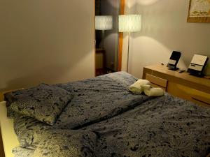 Posteľ alebo postele v izbe v ubytovaní Apartament przy lesie
