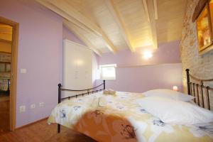 Postel nebo postele na pokoji v ubytování Mery Country House