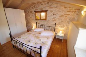 Postel nebo postele na pokoji v ubytování Mery Country House