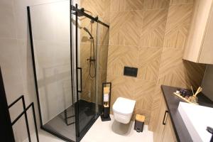 Apartament Harmony tesisinde bir banyo