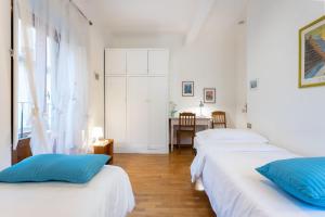 Posteľ alebo postele v izbe v ubytovaní Del Corso Apartment