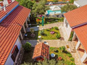 an overhead view of a garden between two buildings at Villa Štrkalj ZadarVillas in Murvica