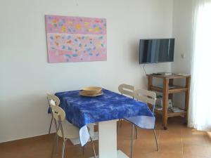Televízia a/alebo spoločenská miestnosť v ubytovaní Apartments Magdalena AS1