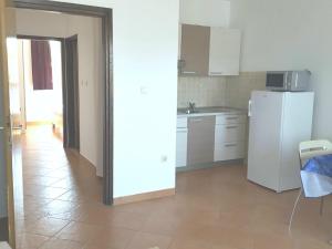 Kuchyňa alebo kuchynka v ubytovaní Apartments Magdalena AS1